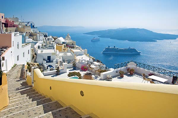 Fira panorama with caldera view and Nea Kameni, Santorini, Greece