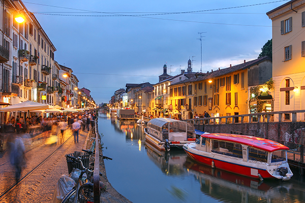 Evening scene along the Naviglio Grande canal in Milan, Italy.